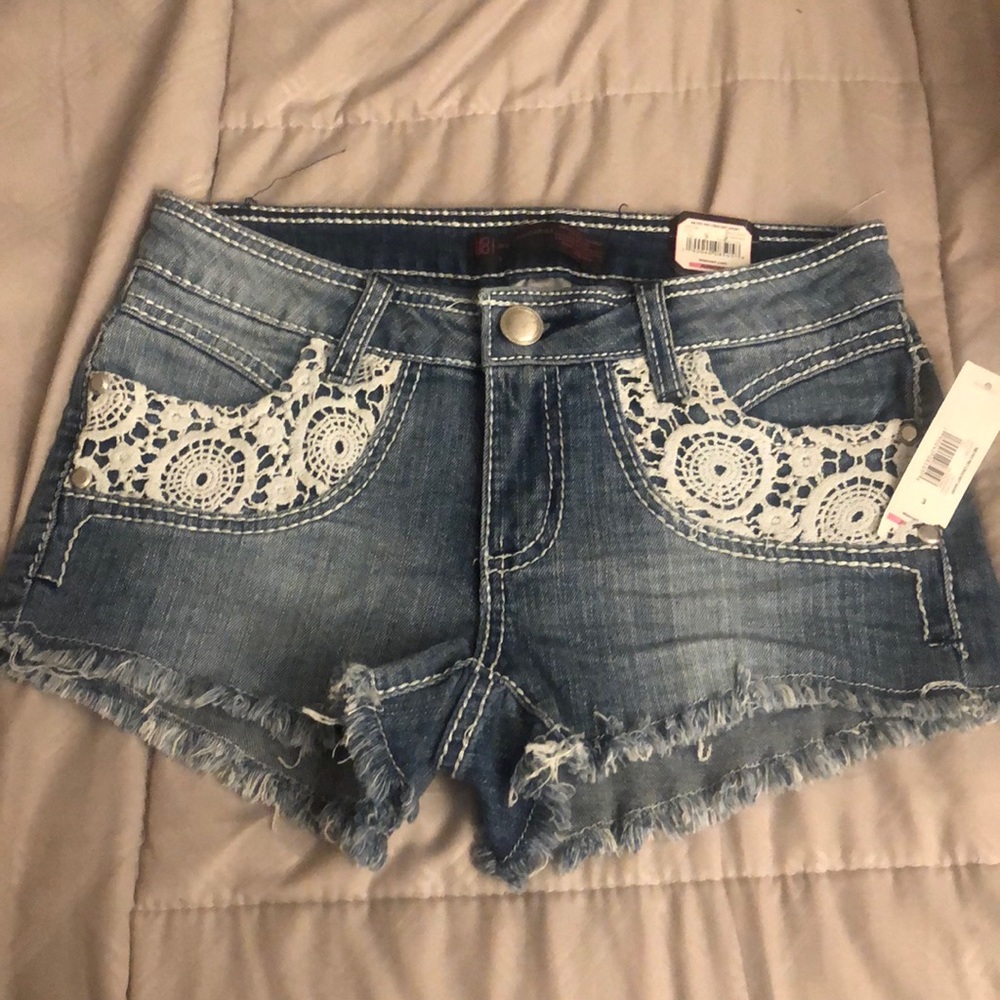New jean shorts, tags attached, size 3 lace accent